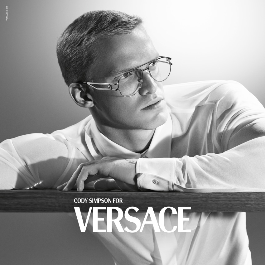 Cody Simpson wearing Versace clear frame glasses